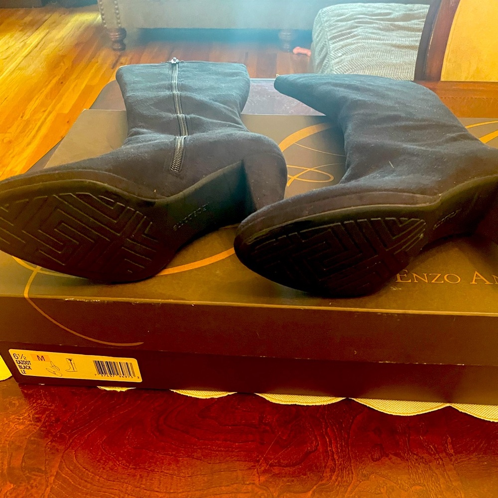 Black suede boots Never worn comes a little below the knee